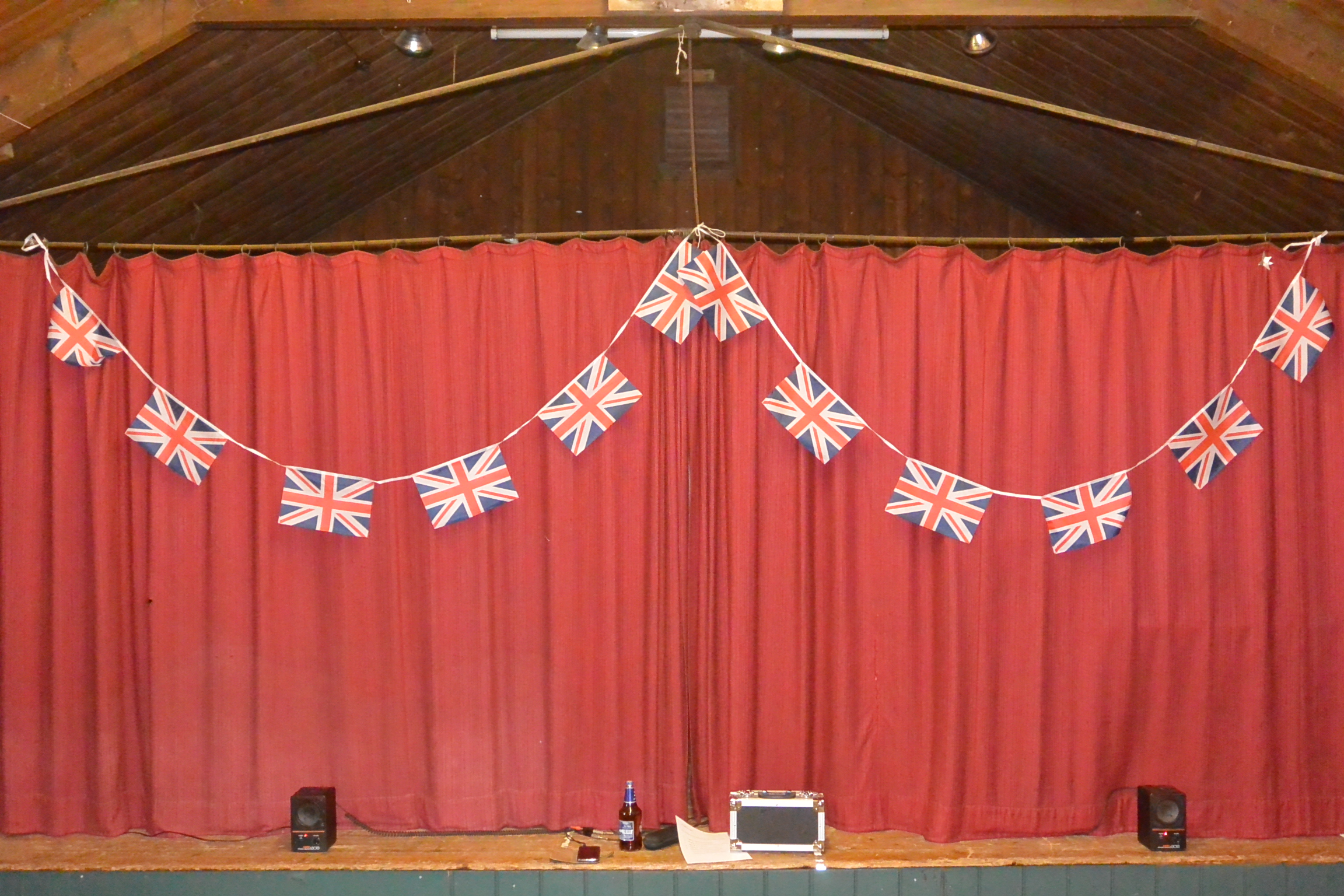 Union flags against curtain